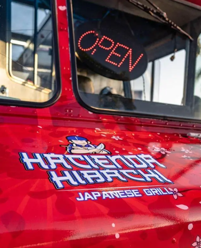 Hacienda Hibachi food truck with OPEN sign lit up